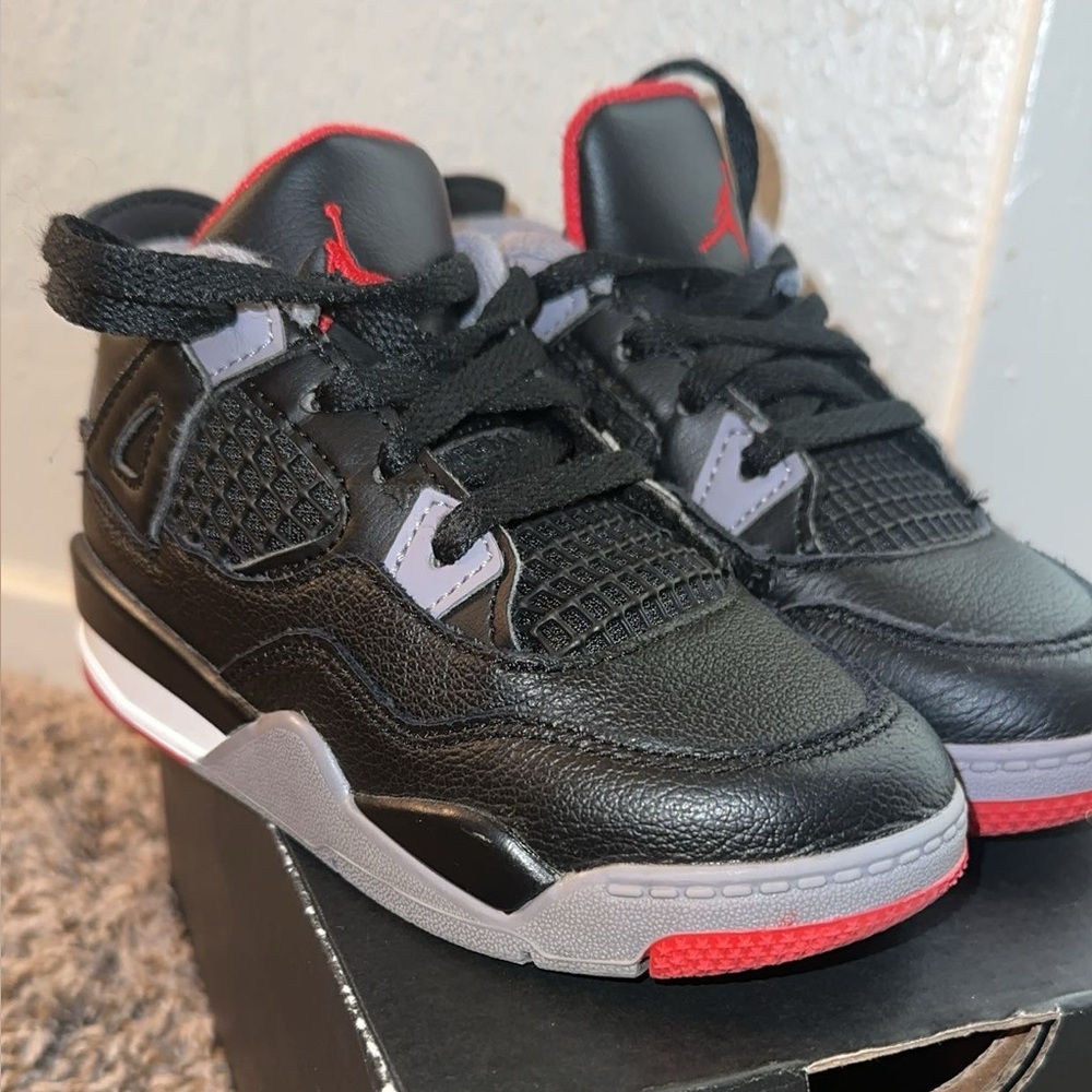 Jordan Kids Black and Gray Sneakers with Red Highlights